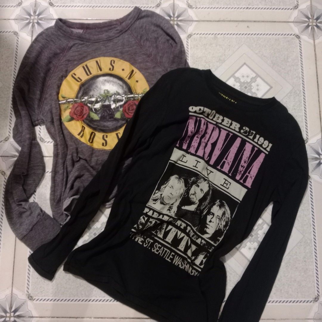 Nirvana and Guns N' Roses long sleeve shirts bundle (Category: Activewear) located in Silang. Submitted by densrodrig08604 (Listing ID 1467810700, Image 1). Description: Two band tees in one bundle. First is a black Nirvana long sleeve from Zara Boys, size 13/14 years or 164 cm, dated 2013, featuring band members and Seattle graphics. Second is a dark grey heather Guns N' Roses long sleeve from Bravado, size M, with the classic bullet logo and ro