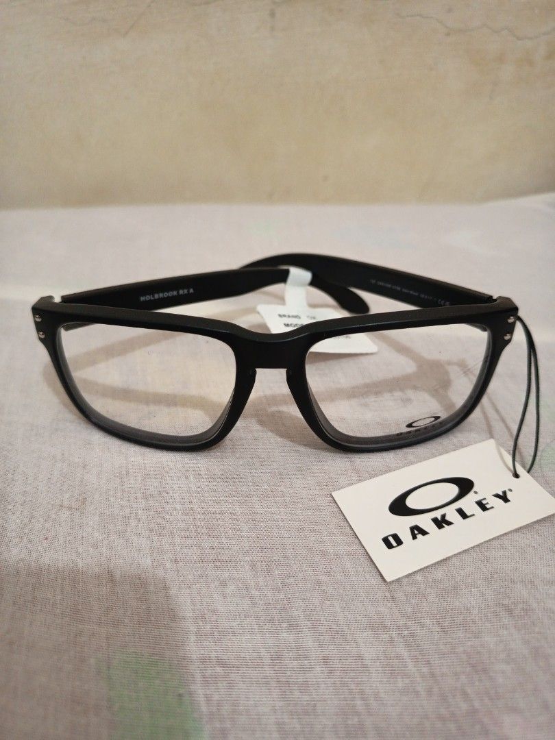 OAKLEY HOLBROOK Eyeglasses (Category: Sunglasses & Eyewear) located in Bacoor. Submitted by imshining_23 (Listing ID 1467673663, Image 2). Description: OAKLEY HOLBROOK Eyeglasses Model 0OX8100F GRV 81000156 Package inclusions : Oakley Eyeglasses, Oakley Protective Carrying Case, and Oakley Soft Carrying Case..