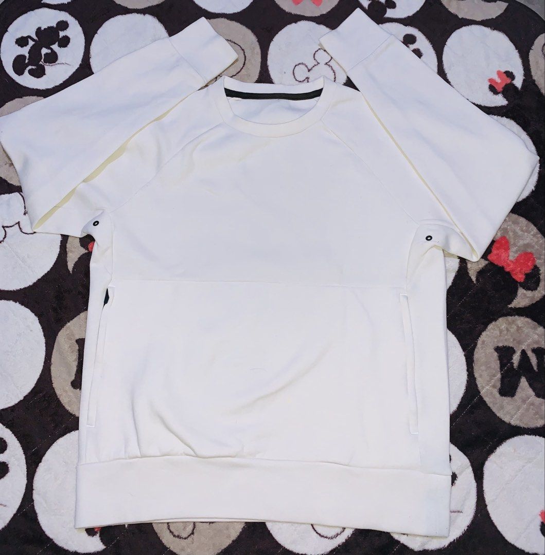 Off-white crewneck sweatshirt (Category: Coats, Jackets and Outerwear) located in Pasig City. Submitted by nyca1989 (Listing ID 1467770725, Image 1). Description: Off-white crewneck sweatshirt features a clean, minimalist design with side zipper or seam pockets and raglan-style sleeves. Large size YKK zipper .