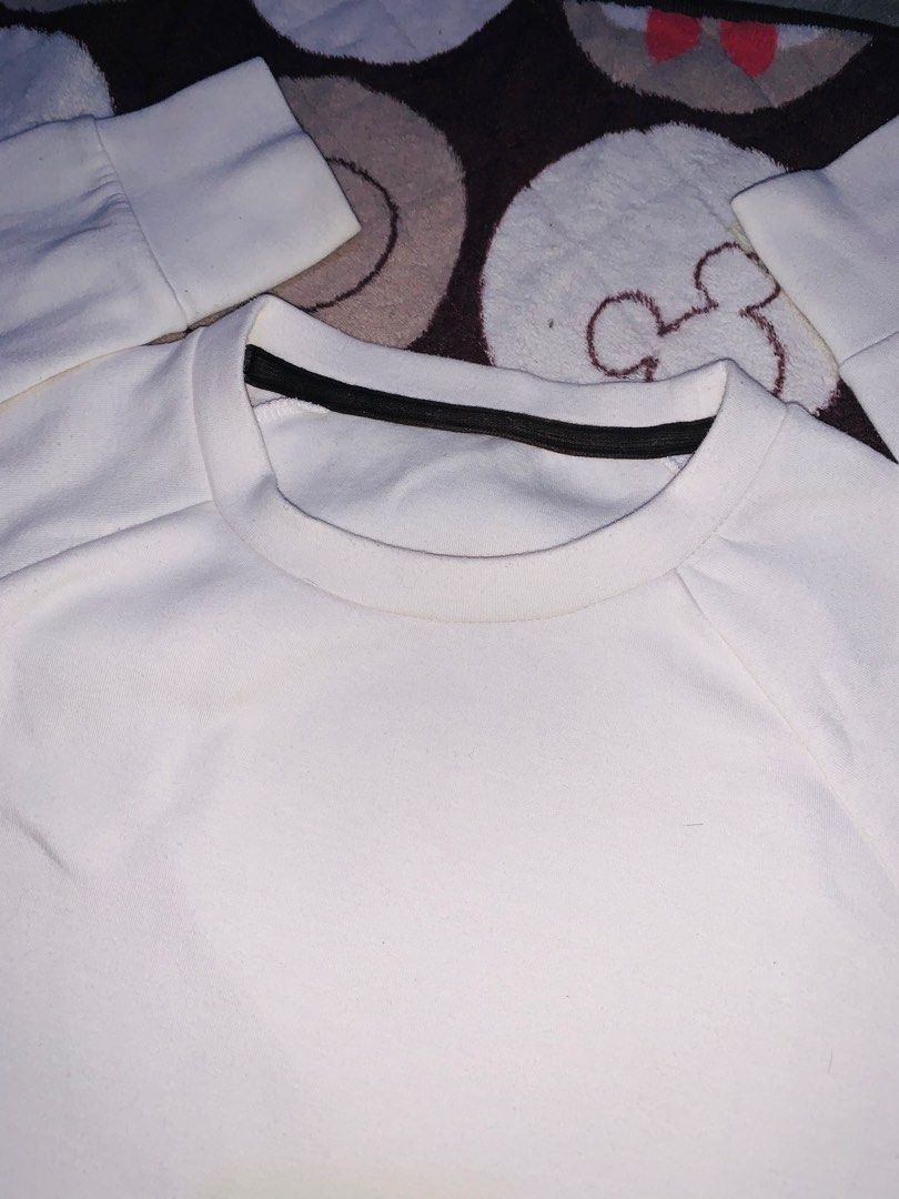 Off-white crewneck sweatshirt (Category: Coats, Jackets and Outerwear) located in Pasig City. Submitted by nyca1989 (Listing ID 1467770725, Image 2). Description: Off-white crewneck sweatshirt features a clean, minimalist design with side zipper or seam pockets and raglan-style sleeves. Large size YKK zipper .