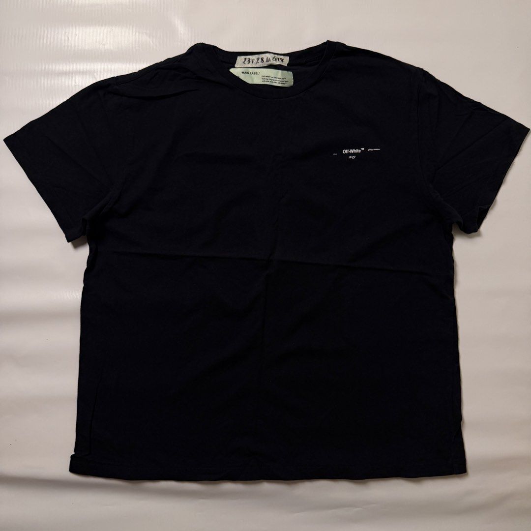 Off-White Spring Summer 2019 Black T-Shirt (Category: Tshirts & Polo Shirts ) located in Gapan. Submitted by rasthriftshop (Listing ID 1467800608, Image 1). Description: OFF WHITE w/back hit Size on tag: M Dimes: 23 x 28 ₱500 + sf Condition: Excellent Color rate: 9/10 Issue: None.