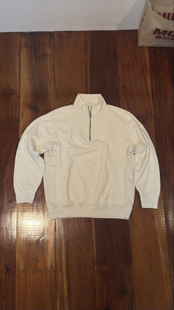 Off-white Uniqlo Quarter Zip (Category: Coats, Jackets and Outerwear) located in Manila. Submitted by royalgem-3655 (Listing ID 1467707957, Image 1). Description: - Brand: Uniqlo - Style: Quarter zip sweatshirt / mock neck - Color: Cream / off-white - Size: L - Material: Heavyweight cotton fleece - Condition: Clean, minimal casual wear - Features: Ribbed cuffs and hem, metal zipper pull, great layering piece.