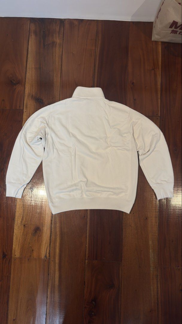 Off-white Uniqlo Quarter Zip (Category: Coats, Jackets and Outerwear) located in Manila. Submitted by royalgem-3655 (Listing ID 1467707957, Image 2). Description: - Brand: Uniqlo - Style: Quarter zip sweatshirt / mock neck - Color: Cream / off-white - Size: L - Material: Heavyweight cotton fleece - Condition: Clean, minimal casual wear - Features: Ribbed cuffs and hem, metal zipper pull, great layering piece.
