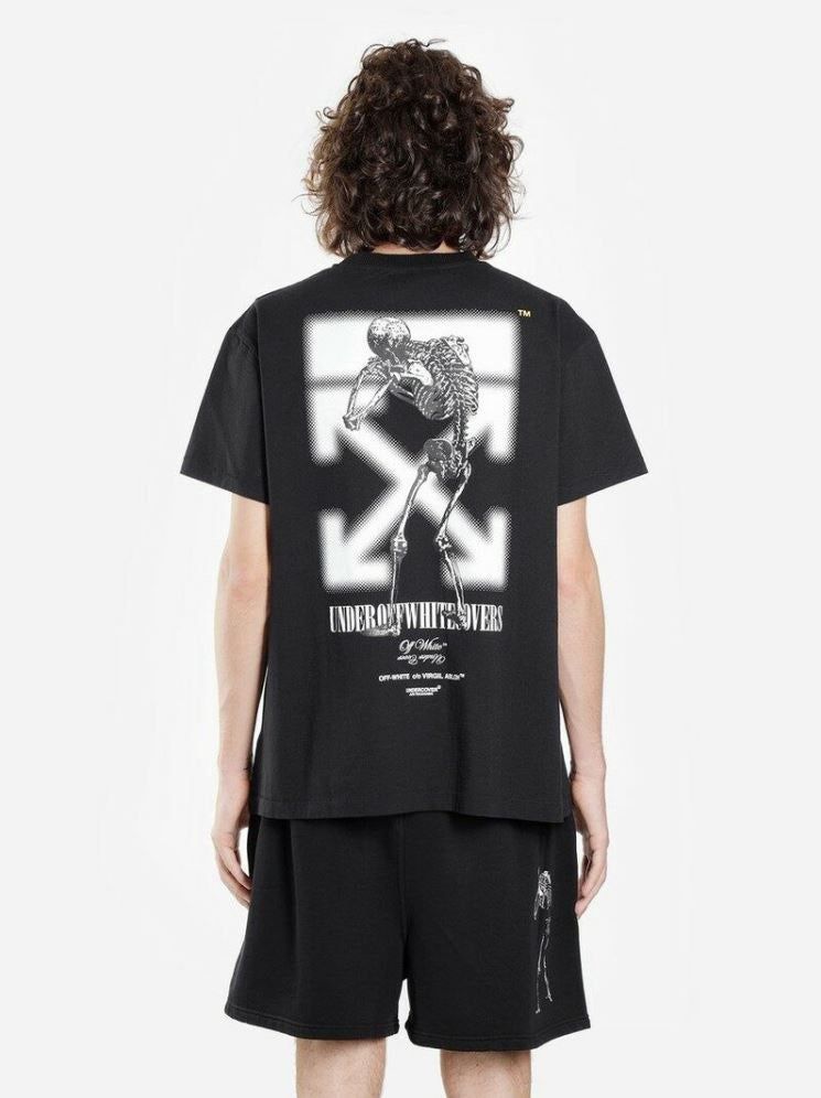 Off-White x Undercover Skeleton Dart T-Shirt (Category: Tshirts & Polo Shirts ) located in Naga. Submitted by trashfinds (Listing ID 1467777956, Image 2). Description: This item is the Off-White x Undercover Skeleton Dart T-Shirt from their highly sought-after 2019 “UNDEROFFWHITECOVERS” collaborative capsule collection. The piece combines Jun Takahashi’s Undercover aesthetic with Virgil Abloh’s Off-White signature styling. It features a unique ch