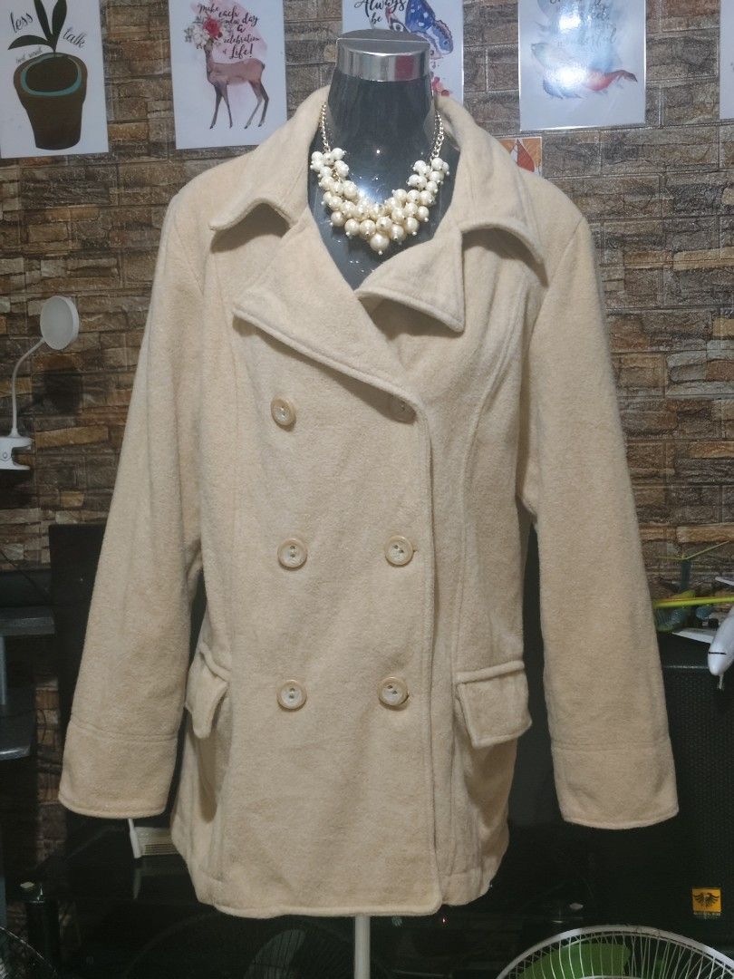 Old Navy Tan Double Breasted Pea Coat Plus Size XL (Category: Coats, Jackets and Outerwear) located in Manila. Submitted by duffy-080 (Listing ID 1467619865, Image 2). Description: - Brand: Old Navy - Size: Size XL - Color: Classic Tan - Material: Warm wool-blend feel with silky full lining - Design: Double-breasted button front, collar neckline, and structured shoulders - Details: Matching cuff buttons, back waist tab, and two front hip slip poc
