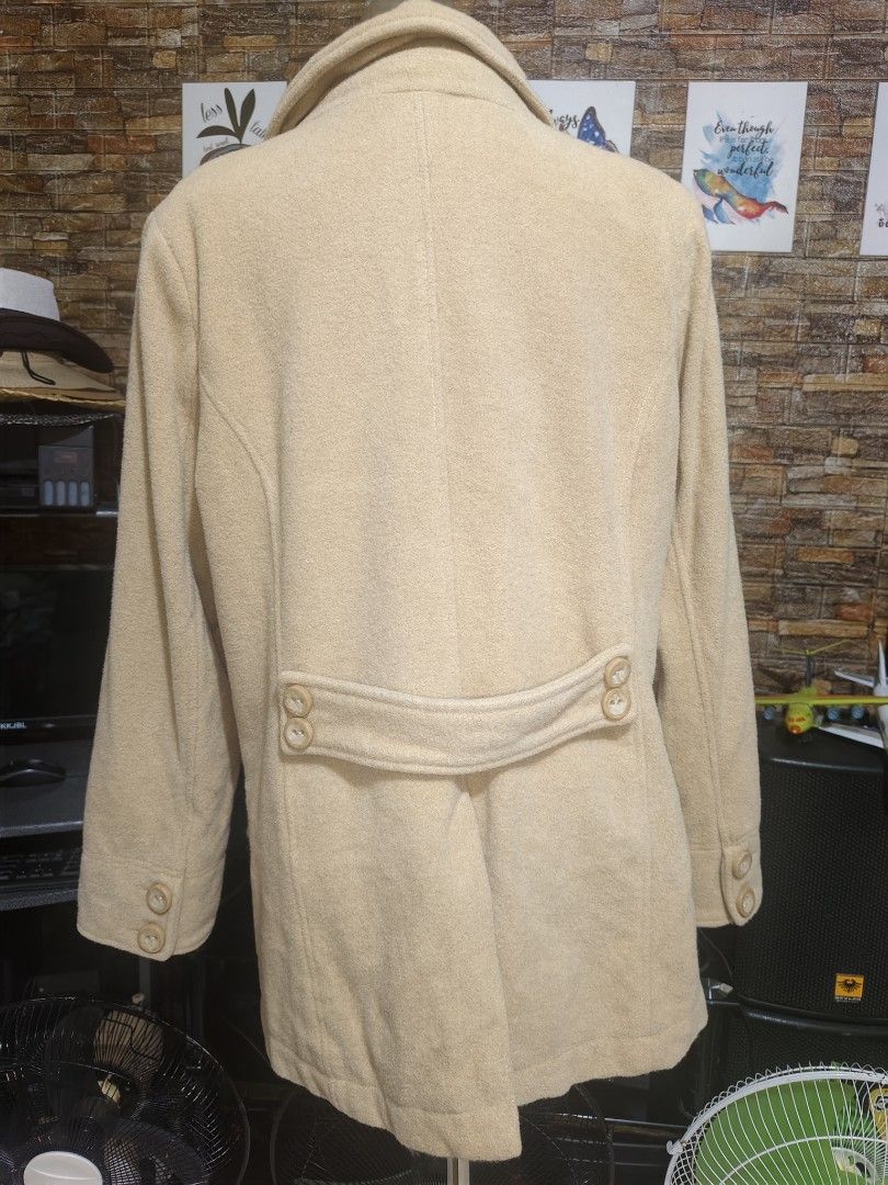 Old Navy Tan Double Breasted Pea Coat Plus Size XL (Category: Coats, Jackets and Outerwear) located in Manila. Submitted by duffy-080 (Listing ID 1467619865, Image 3). Description: - Brand: Old Navy - Size: Size XL - Color: Classic Tan - Material: Warm wool-blend feel with silky full lining - Design: Double-breasted button front, collar neckline, and structured shoulders - Details: Matching cuff buttons, back waist tab, and two front hip slip poc