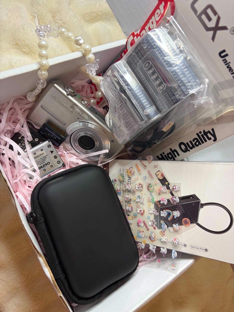 Olympus digital camera bundle with case and accessories (Category: Cameras) located in Caloocan City. Submitted by xandrycapada (Listing ID 1467608845, Image 2). Description: 🎀 𝒐𝒍𝒚𝒎𝒑𝒖𝒔 𝒇𝒆-220 𝒅𝒊𝒈𝒊𝒄𝒂𝒎 ♡ ୨୧ 𝒊𝒏𝒄𝒍𝒖𝒔𝒊𝒐𝒏𝒔 🎀 ౨ৎ 2 batteries ౨ৎ charger ౨ৎ xD card ౨ৎ card reader ౨ৎ pouch ♡ 𝒚𝒐𝒖𝒓 𝒏𝒆𝒙𝒕 𝒇𝒂𝒗 𝒅𝒊𝒈𝒊𝒄𝒂𝒎 𝒇𝒐𝒓 𝒄𝒖𝒕𝒆 𝒍𝒊𝒕𝒕𝒍𝒆 𝒎𝒆𝒎𝒐𝒓𝒊𝒆𝒔! 🎀📸.