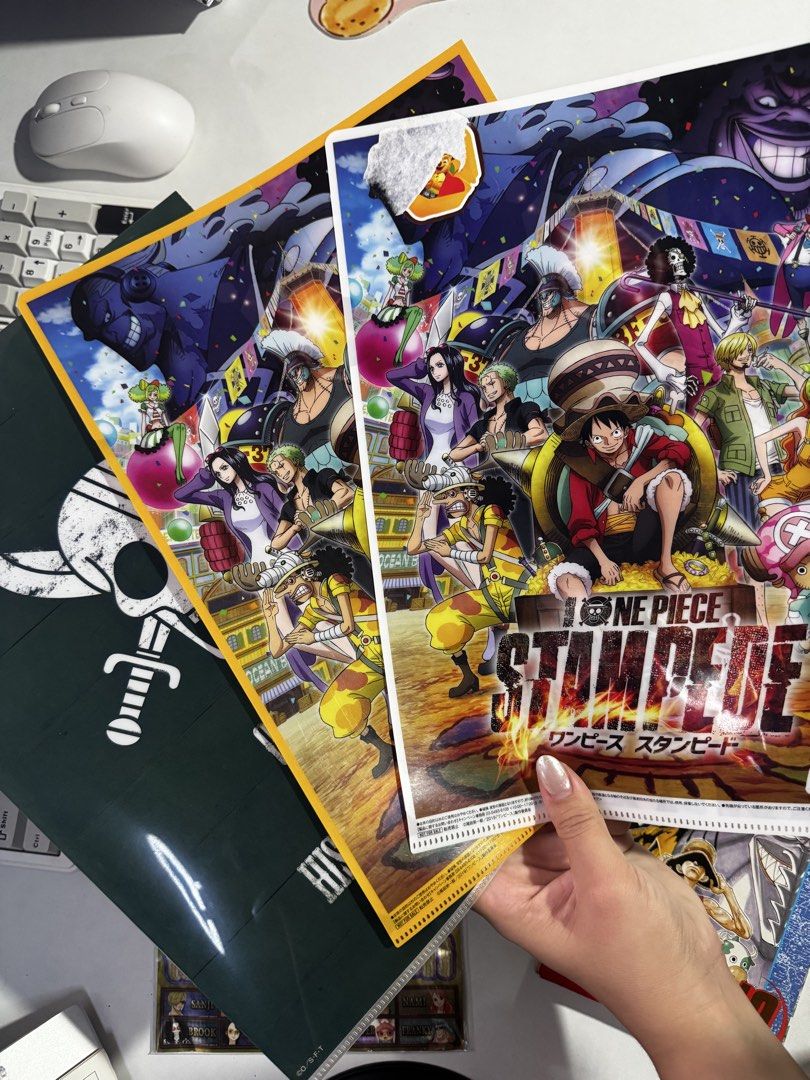 One Piece manga, folders, and sticker sheets bundle (Category: Stationery & School Supplies) located in Penaranda. Submitted by deardarlaph_ (Listing ID 1467706660, Image 2). Description: - One Piece Volume 10 manga - Includes character folders and metallic sticker sheets - Features Stampede movie and Red Hair Pirates artwork - Includes special Gold foil stickers.