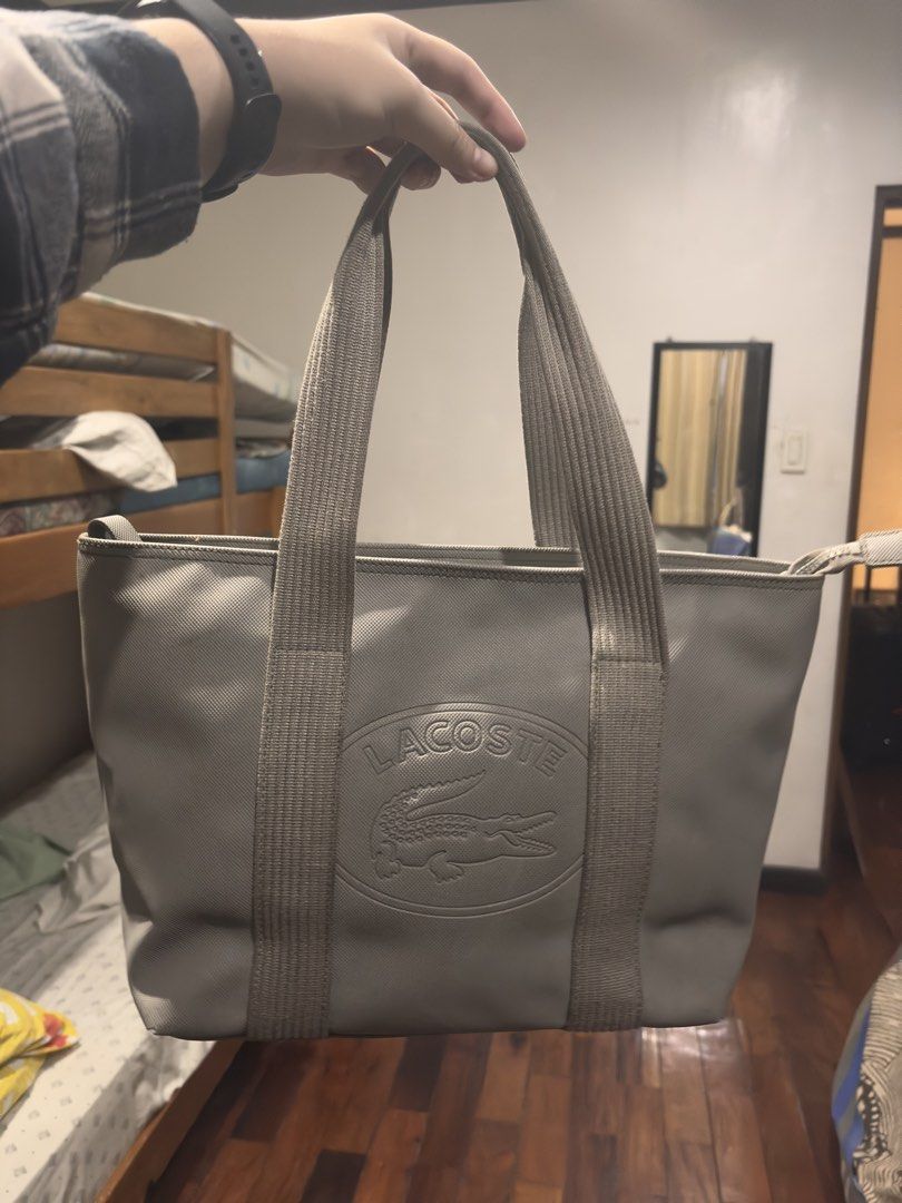 original authentic lacoste bag (Category: Tote Bags) located in Las Pinas. Submitted by kylloren_ (Listing ID 1467733922, Image 2). Description: - still negotiable for sure buyers - issues can be found at the last few slides - shipping is thru j&t - what you see is what you get po, pls manage your expectations .