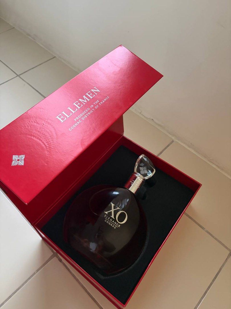 Original French Brandy / Cognac (Category: Beverages) located in Pasig City. Submitted by johnbragado (Listing ID 1467718915, Image 2). Description: - Authentic Ellemen XO Elegance Cognac from the Cognac district, France - Large rounded glass bottle with an elegant clear crystal stopper - Features classy gold lettering on the front - 100% unopened and properly stored - Includes a heavy red presentation box with a secure black foam interior insert