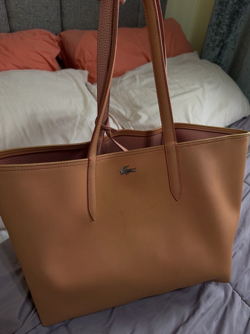 Original Lacoste Bag orange Leather (Category: Luxury Bags & Wallets) located in Cainta. Submitted by lexabeaonlineshoppe (Listing ID 1467617662, Image 1). Description: Pre-loved Selling my Original Lacoste Large Bag Orange Leather bag Large tote bag Marami pwede ilagay Nabili ko sa Eastwood libis Mall Original price-7999 Selling for 4500 only.