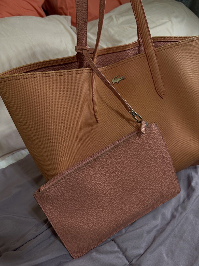 Original Lacoste Bag orange Leather (Category: Luxury Bags & Wallets) located in Cainta. Submitted by lexabeaonlineshoppe (Listing ID 1467617662, Image 2). Description: Pre-loved Selling my Original Lacoste Large Bag Orange Leather bag Large tote bag Marami pwede ilagay Nabili ko sa Eastwood libis Mall Original price-7999 Selling for 4500 only.