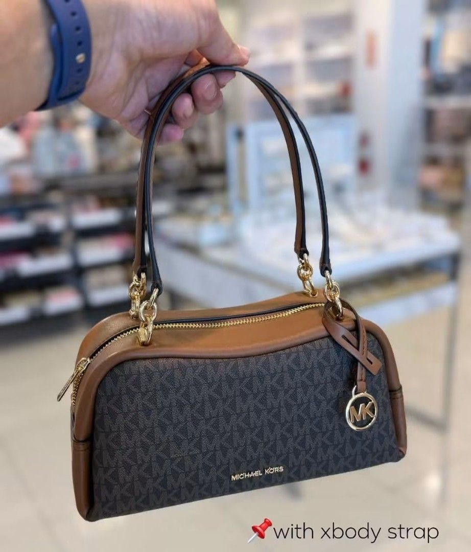 Original MK Cecily Small Shoulder Bag in Brown (Category: Luxury Bags & Wallets) located in Manila. Submitted by msddirectfactoryoutlet (Listing ID 1467730827, Image 1). Description: M* Cecily Small Shoulder Bag In Brown *Gold-tone hardware *10.75”(W) X 5.25”(H) X 4.5”(D) *Handle drop: 10.5″ *Exterior details: detachable strap *Interior details: back slip pocket *Lining: 100% polyester *Zip fastening Brandnew with tag and cc Onhand Pinas.