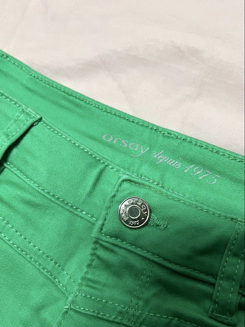 ORSAY - GREEN SKIRT (Category: Skirts) located in Manila. Submitted by herxi (Listing ID 1467723338, Image 1). Description: - stretchy fabric - bright green RFS : decluttering.