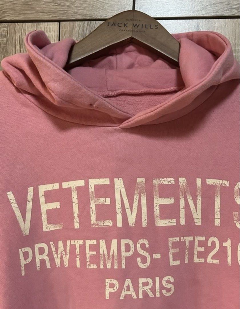 Oversized Pink Hoodie Jacket (Category: Coats, Jackets and Outerwear) located in Bulacan. Submitted by relove.re (Listing ID 1467747192, Image 3). Description: VETEMENTS Pink Hoodie 💗 Stylish pink pullover hoodie featuring a white VETEMENTS Paris graphic print. Designed with a hood, long sleeves, ribbed cuffs, and a relaxed fit for a trendy streetwear look. Perfect for casual wear and everyday OOTDs. Size S-M-L Petite ✨ Color: Pink ✨ Style: Pull