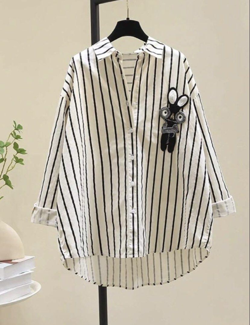 Oversized striped button polo (Category: Shirts) located in Pasay City. Submitted by sandybuggy (Listing ID 1467753017, Image 1). Description: .