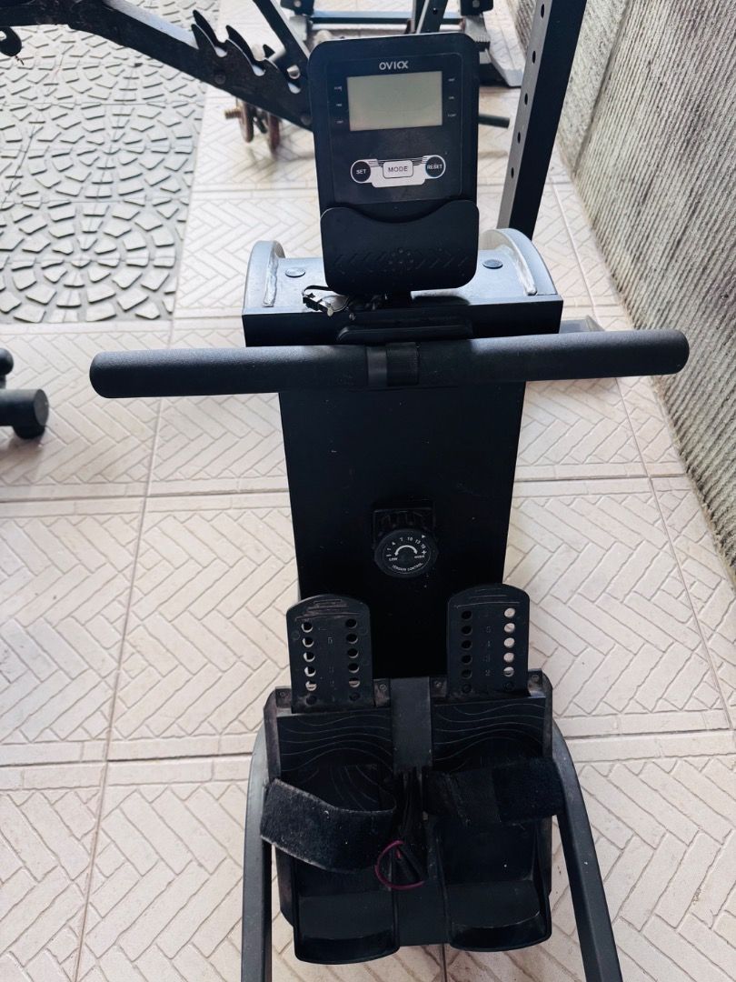 Ovix Rowing Machine Exercise Equipment (Category: Cardio & Fitness Machines) located in Caloocan City. Submitted by mommyivysells (Listing ID 1467625855, Image 2). Description: - Brand: Ovix Rowing Machine - Condition: Fully functional, indoor cardio equipment - Monitor: Digital display tracks reps and workout stats - NOT Working - Resistance: Easily adjustable dial on the front unit - Comfort & Safety: Smooth-sliding cushioned seat and secure fo