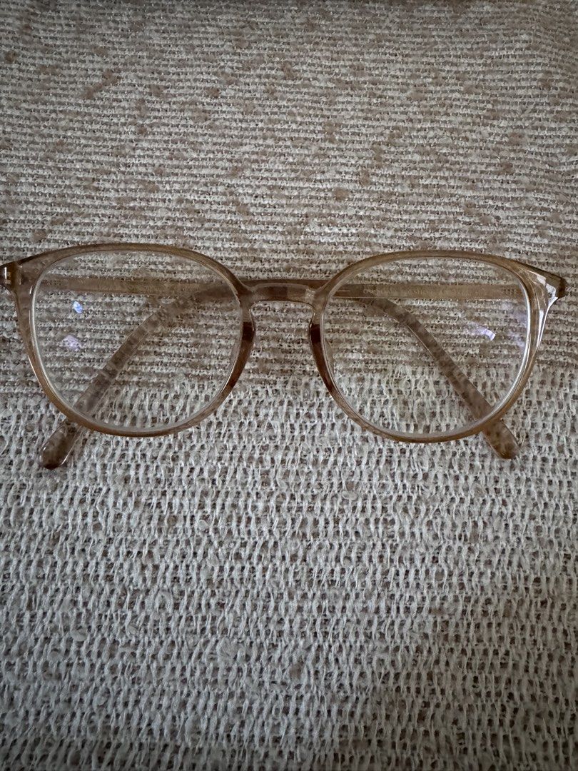 OWNDAYS Clear Pink Round Eyeglasses with Case (Category: Sunglasses & Eyewear) located in Marikina City. Submitted by switkimchi (Listing ID 1467632833, Image 2). Description: - Brand: OWNDAYS - Style: Classic round optical frames - Color: Translucent pinkish tone - Lenses: Clear (non-prescription/stock) - Material: Lightweight acetate with temple branding - Condition: Minimal wear overall - Inclusion: Original white hard case with black velvet i
