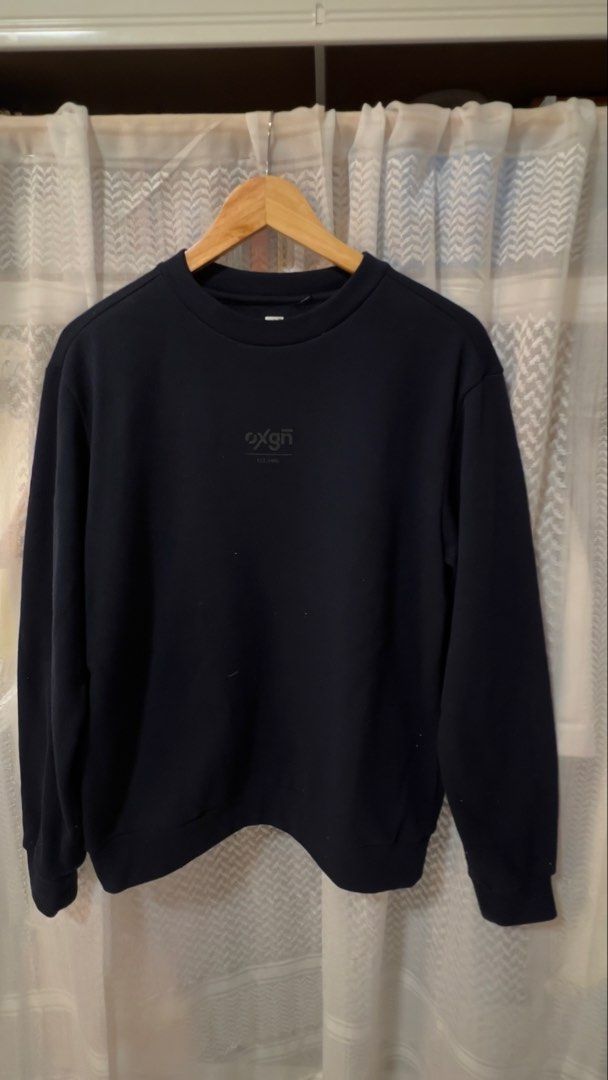 Oxgn Black Crewneck Sweatshirt Size S (Category: Coats, Jackets and Outerwear) located in Pasig City. Submitted by morilove (Listing ID 1467677570, Image 1). Description: - Brand: OXGN (Est. 1996) - Style: Classic crewneck pullover sweatshirt - Size: Small - Color: Solid Black - Details: Subtle dark grey chest print logo and 'For All Generations' collar tag - Features: Comfortable ribbed cuffs and hem - Condition: Excellent pre-loved/ready to wea