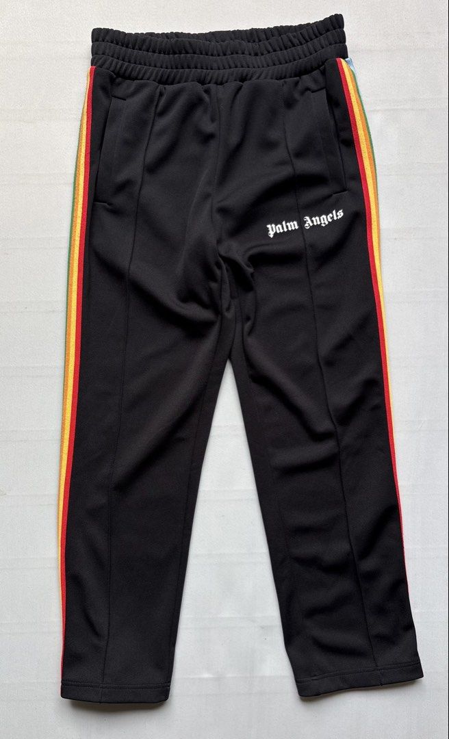PALM ANGELS Black Rainbow Classic Track Pants (Category: Joggers) located in Baguio. Submitted by viibodegaaa (Listing ID 1467737102, Image 2). Description: Item: PALM ANGELS Black Rainbow Classic Track Pants Size: M Waist: 15’ **unstretched** Rise: 14’ Thigh: 12’ Inseam: 28’ Length: 38.5’ Leg opening: 7’ Price: 2280.