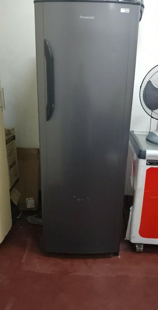 Panasonic Single Door Refrigerator Dark Grey (Category: Refrigerators and Freezers) located in Dumaguete. Submitted by claymore318 (Listing ID 1467772723, Image 1). Description: - Brand/Model: Panasonic single door refrigerator - Color: Dark grey finish with a long vertical black handle - Condition: Working and ready for use (note: noticeable scuff marks and minor paint chipping near the bottom center of the door) - Pickup: Available for pickup o