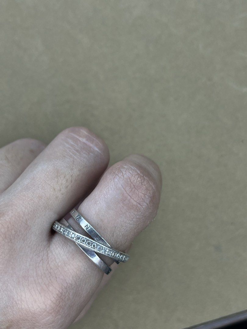 Pandora Interlocked Circles Pavé Ring Size 54 (Category: Rings) located in Bulacan. Submitted by vintagetreasureby.mivida (Listing ID 1467642304, Image 1). Description: - Authentic Pandora triple interlocked ring made of sterling silver - Features one band with sparkling clear pavé stones and two smooth bands - Stamped with PANDORA lettering and hallmarked S925 ALE 54 on the inside - Ring size: US 7 / UK N (measured on sizing mandrel) - Clean con