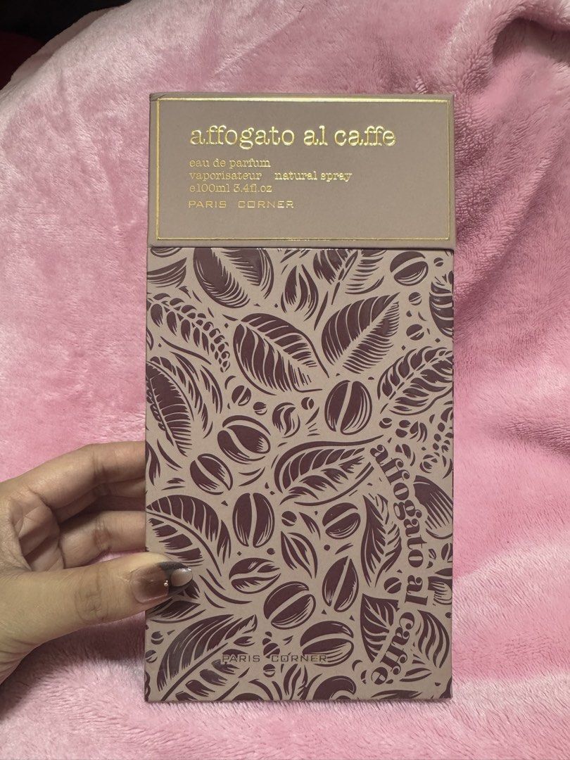 Paris Corner Affogato Al Caffe Eau De Parfum 100ml (Category: Fragrance & Deodorants) located in Arayat. Submitted by janeng_ba10fd (Listing ID 1467793622, Image 1). Description: - Brand: Paris Corner - Fragrance: Affogato Al Caffe - Volume: 100ml (Natural Spray) - Condition: Unused, box opened for photos only - Packaging: Comes with original decorative box - Origin: Made in U.A.E. - Batch Number: AFF0226 - Bottle Design: Contoured bottle with el