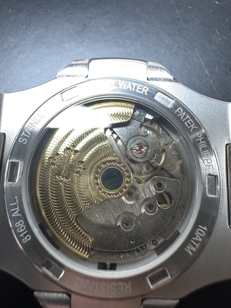 Patek Philippe Nautilus Blue Dial Automatic Watch (Category: Luxury Watches) located in Calamba. Submitted by santipreloveditems (Listing ID 1467612484, Image 3). Description: Patek Philippe Nautilus 5711 Open Back Fully Automatic Pure stainless steel Complete links Slight visible wear Premium luxury watch .