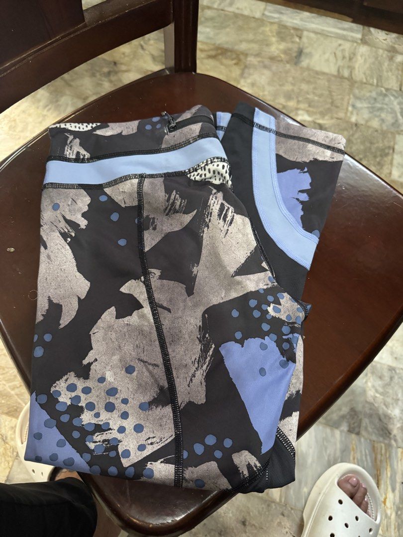 Patterned Athletic Leggings (Category: Activewear) located in Cebu City. Submitted by melotski24 (Listing ID 1467607185, Image 1). Description: - Chic abstract brushstroke print in navy, grey, and light blue - Subtle polka dot accents near the waist and lower leg - Secure elastic waistband with a convenient back zipper pocket - Smooth, stretchy performance fabric for maximum workout comfort - Great for the gym, running, or casual athleisure wear 
