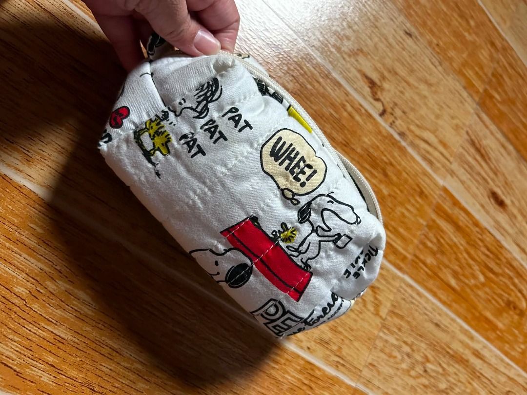 Peanuts Snoopy Quilted Cosmetic Pouch Zippered (Category: Purses & Pouches) located in Bulacan. Submitted by jseongcart_ (Listing ID 1467838734, Image 3). Description: LIKE NEW, USED ONLY 2X CAN FIT MAKEUP BRUSHES NOTE: WASH BEFORE USE IF SENSTIVE TO USED/PRELOVED ITEMS --------------------------------- - Peanuts design featuring Snoopy and Charlie Brown on a crisp white quilted fabric - Compact and versatile size, ideal for organizing makeup, st