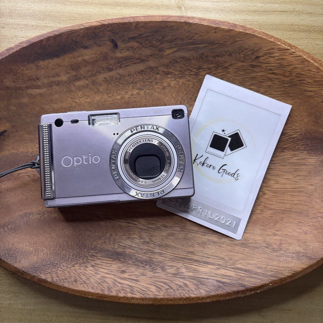 Pentax Optio S5i Digital Camera Digicam (Category: Cameras) located in Caloocan City. Submitted by lynaldeax (Listing ID 1467630712, Image 1). Description: Pentax Optio S5i Digital Camera RARE UNIT 8/10 cosmetic All working Lens ok Flash ok Zoom ok *some signs of usage / scratches NO FUNCTIONAL ISSUE! Ready to use! 5.0 megapixels 3x Zoom w/ viewfinder!! FEATURES: - Super compact! (Credit card size!) - Quickshot, Micro, Landscape - Flash control -