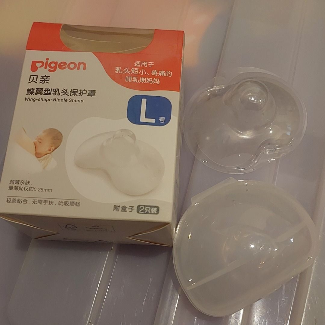 Pigeon Wing-Shape Nipple Shield (Size L) (Category: Breastfeeding & Bottle Feeding) located in Bacolod City. Submitted by mommanana (Listing ID 1467677343, Image 1). Description: Pigeon Wing-Shape Nipple Shield (Size L) - item not needed. P500 Original Price: P844.26. Selling for P500 Last Price - Brand: Pigeon - Size: L (Wing-shape design) - Condition: Unused (box opened for photos only) - Features: Ultra-thin material for a natural feel, ideal 