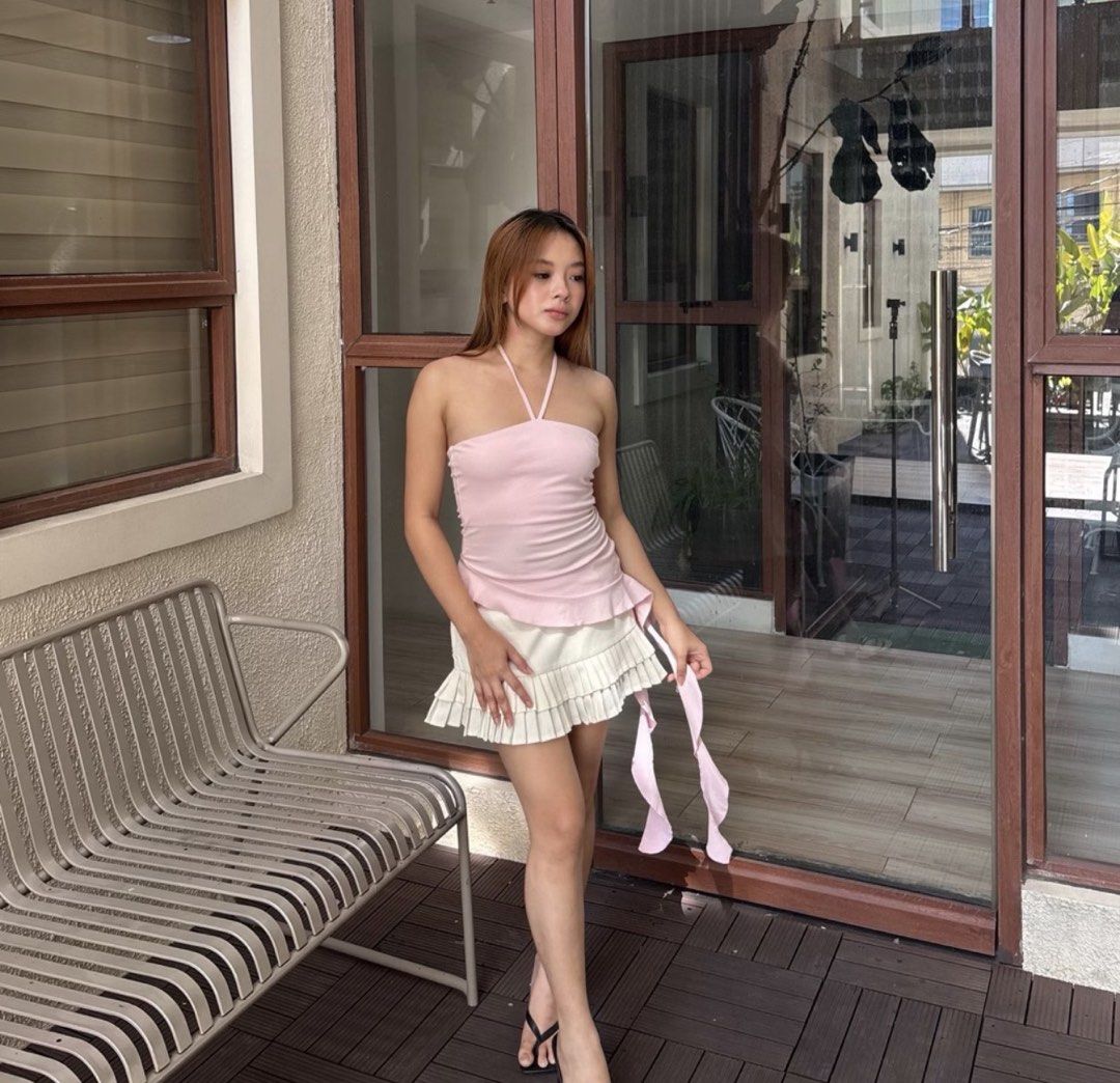 Pink Halter Asymmetrical Ruffle Top (Category: Sleeveless) located in Makati City. Submitted by stitchyyromi (Listing ID 1467829135, Image 3). Description: - brand new, bought from orange app 3 weeks ago for costume but didn’t use it, only worn once to try - zara dooop - true to size, fits medium snugly.
