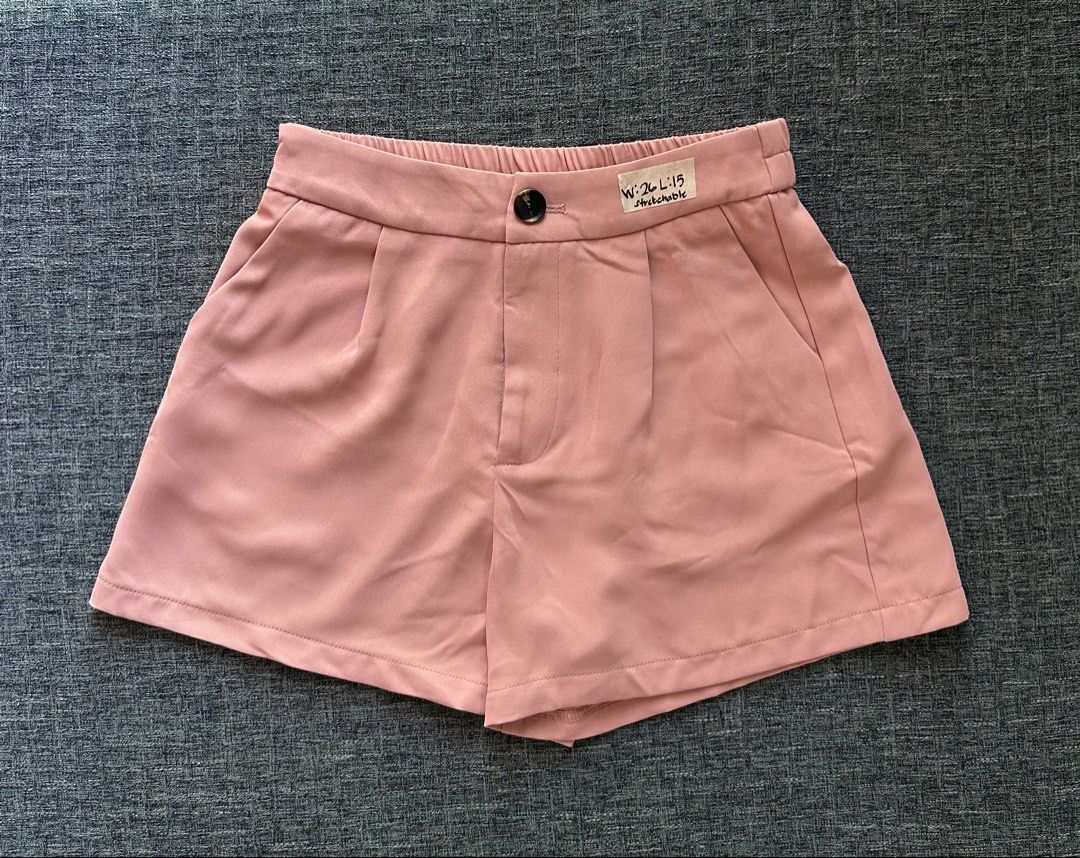 Pink high-waisted shorts with pockets (Category: Shorts) located in Baybay. Submitted by comicowl (Listing ID 1467748441, Image 1). Description: - Color: Pink - Style: High-waisted shorts with front button closure - Measurements: 26-inch waist, 15-inch length - Features: Stretchy fabric and functional side pockets - Condition: Clean and ready to wear - Perfect for: Casual warm-weather outfits.