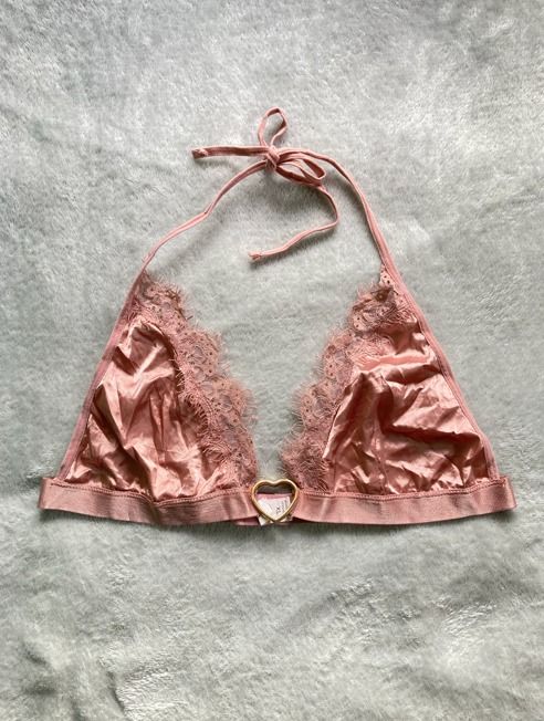 Pink Lace Bralette (Category: Undergarments & Loungewear) located in Rizal. Submitted by sheeraay (Listing ID 1467651272, Image 2). Description: - Style: Pink lace bralette with scalloped edges and a gold-tone heart-shaped ring at the center front - Size: XL.