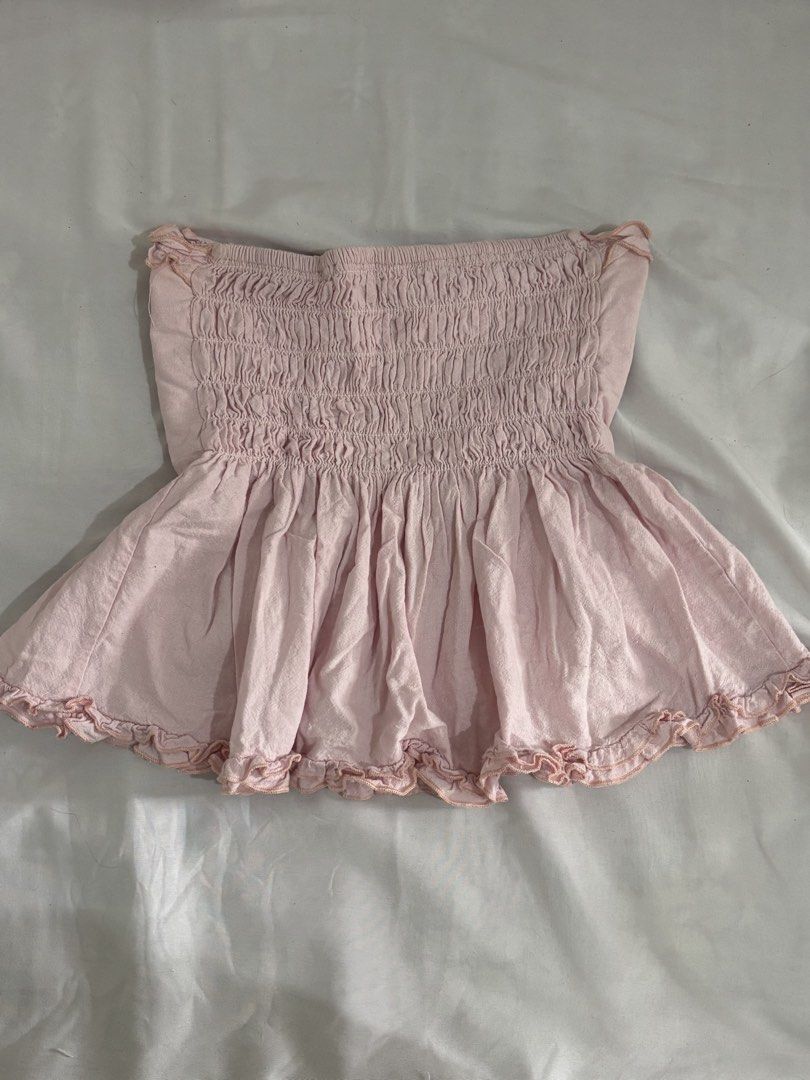 Pink Ruffled Tube Top (Category: Sleeveless) located in Quezon City. Submitted by chrissie__ (Listing ID 1467689474, Image 2). Description: ▪️Well-used.