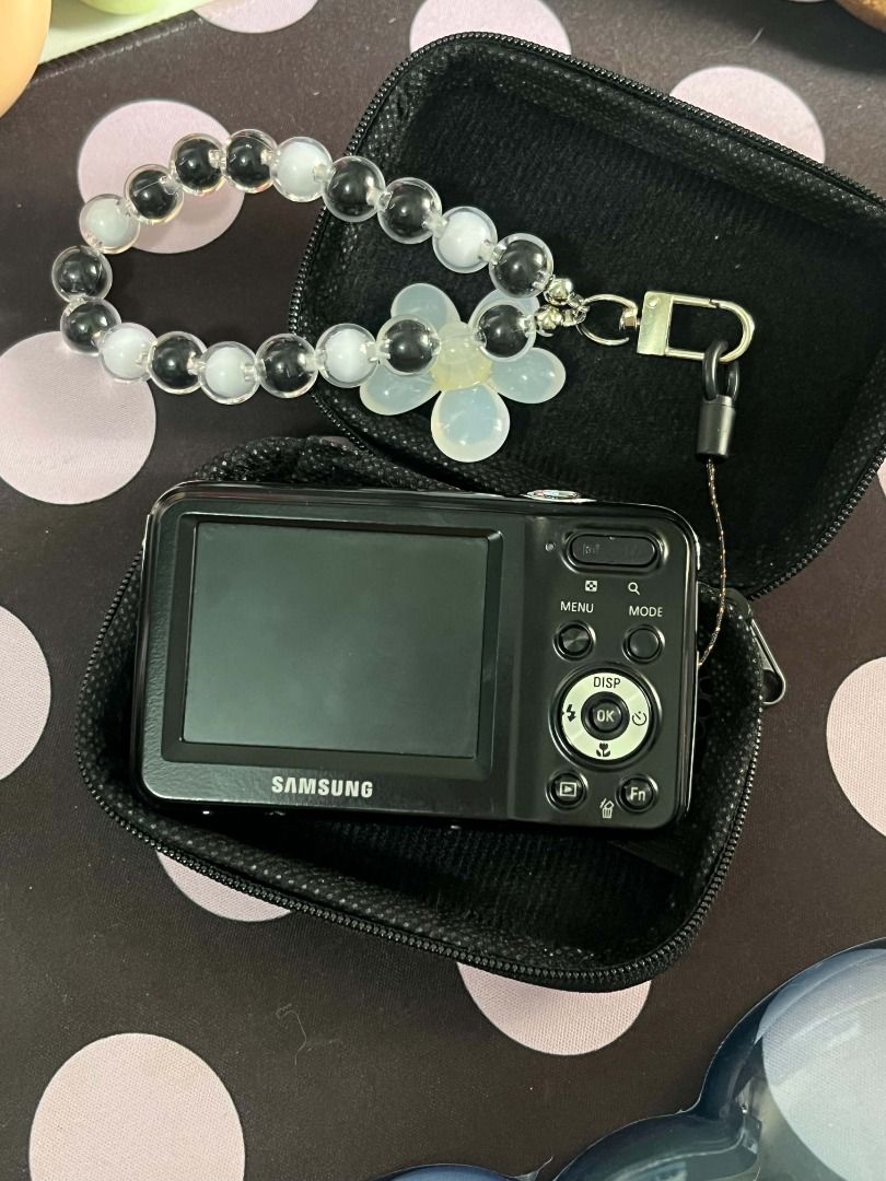 Pink Samsung ES80 Digicam (Category: Cameras) located in Makati City. Submitted by sugaplumbabyy (Listing ID 1467620623, Image 3). Description: * * 12.2MP CCD sensor * * 5x optical zoom — 27-135mm equivalent * * 2.7" LCD display * * Built-in flash ** SD / SDHC / SDXC * * Digital Image Stabilization * * 720p HD video * * BP70A rechargeable battery ISSUE: LCD BURN (Does not affect output) DM for sample photos and more Price is not negotiable.