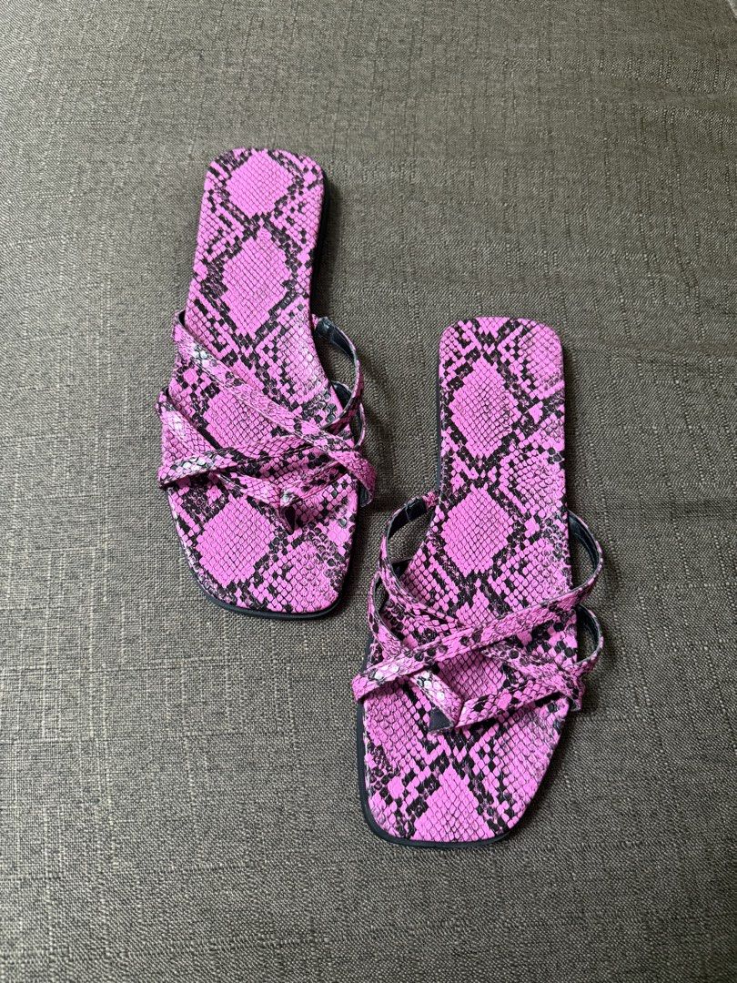 Pink snakeskin print flat sandals square toe (Category: Flats & Sandals) located in Cainta. Submitted by amswardrobe (Listing ID 1467837713, Image 1). Description: - Neon pink and black snakeskin print - Trendy square toe design - Multiple crossover straps with toe post - Comfortable low flat heel - Easy slip-on style for casual wear.