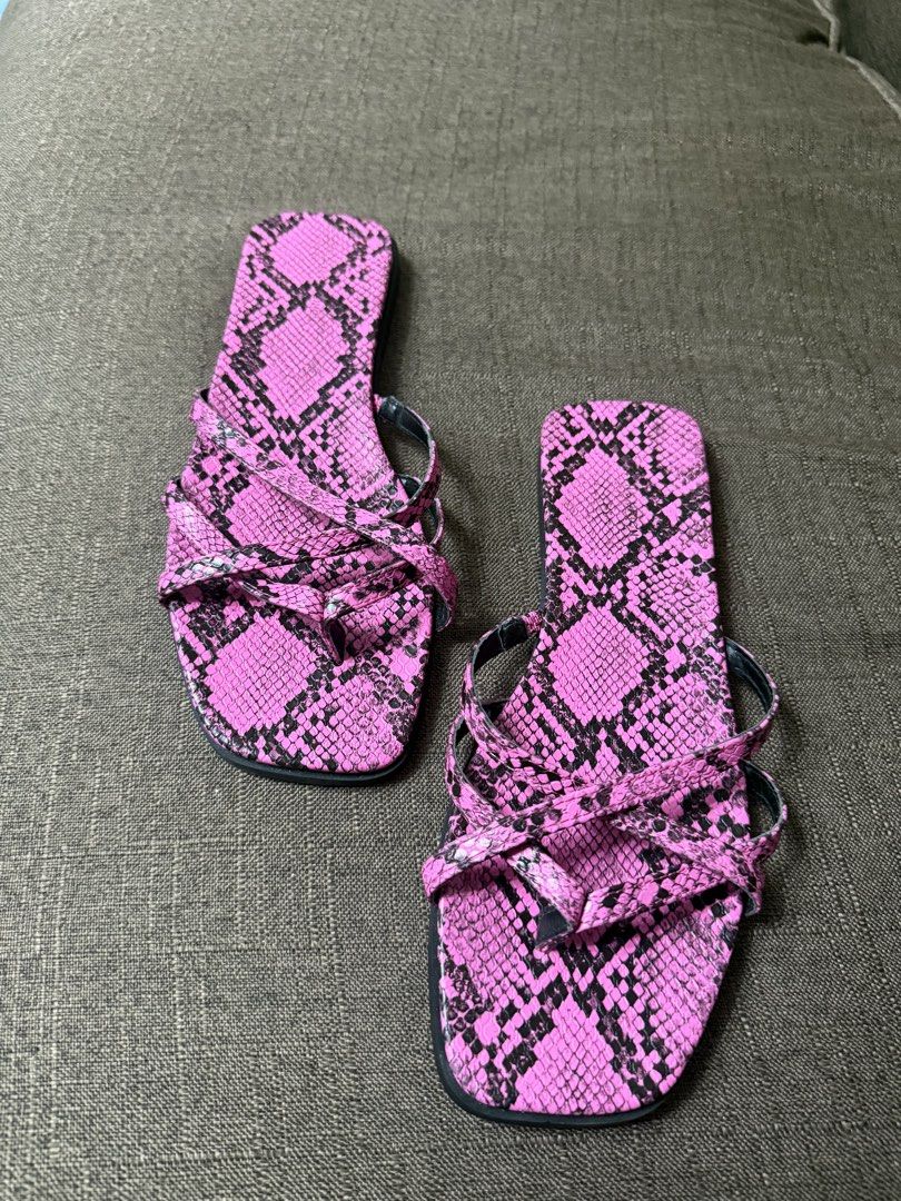 Pink snakeskin print flat sandals square toe (Category: Flats & Sandals) located in Cainta. Submitted by amswardrobe (Listing ID 1467837713, Image 2). Description: - Neon pink and black snakeskin print - Trendy square toe design - Multiple crossover straps with toe post - Comfortable low flat heel - Easy slip-on style for casual wear.