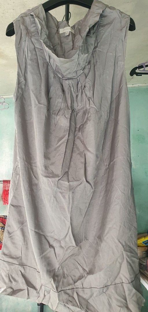 Plastic Island Sleeveless Grey Dress (Medium) (Category: Dresses) located in Cainta. Submitted by origeetostore (Listing ID 1467735018, Image 1). Description: - Brand/Style: Plastic Island gray sleeveless dress - Size: Medium (M) - Design: Soft draped cowl neckline with gathered front pleats - Fit: Simple straight cut with a banded hem and easy slip-on style - Versatility: Comfortable and chic for both casual days and office wear - Details: Featu