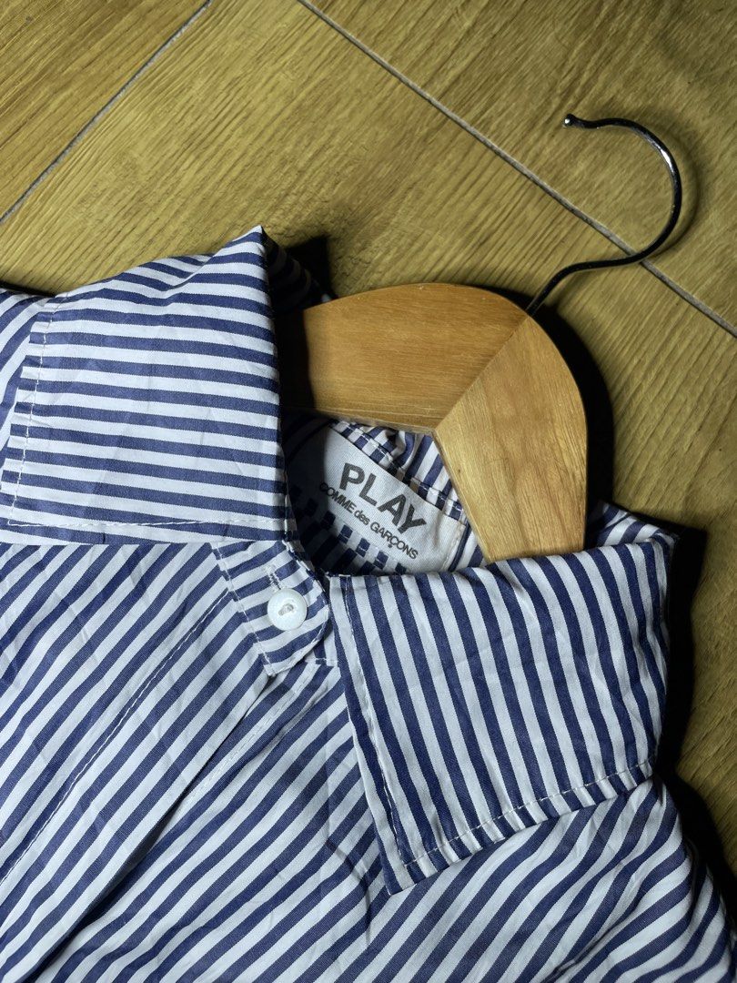 Play CDG (Category: Formal Shirts) located in Tacloban City. Submitted by susthriftshop (Listing ID 1467833712, Image 3). Description: Cdg Play button dowm Excellent condition No flaws aside missing washtag Color rate 9.5/10 Dimes 22 by 28 .