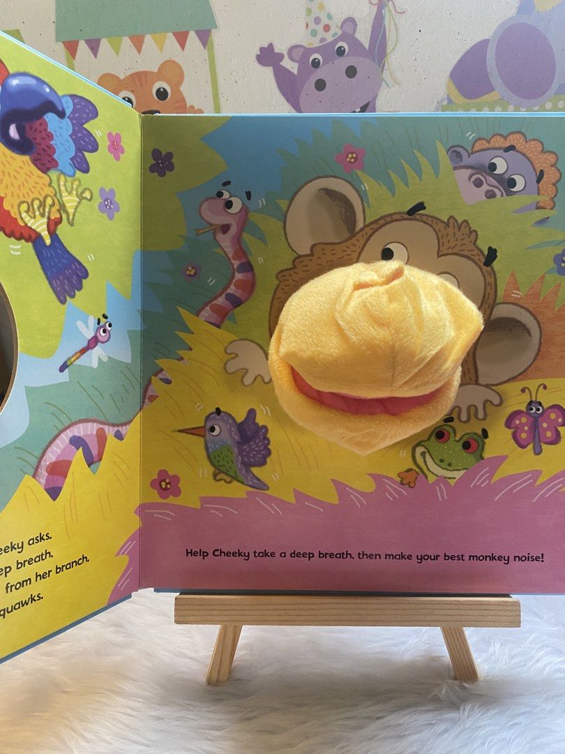 Play Jokes With Cheeky Monkey Interactive Board Book (Category: Children's Books) located in Quezon City. Submitted by donagraceliwanag (Listing ID 1467733977, Image 3). Description: - Title: Play Jokes With Cheeky Monkey - Interactive plush monkey nose puppet built into the cover and pages - Colorful illustrations with fun prompts like tickling the nose or making monkey noises - Sturdy board book design, perfect for toddlers and little hands - G