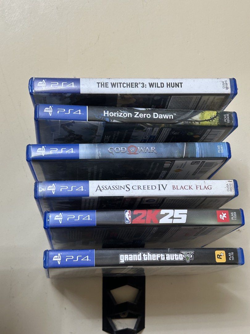 PlayStation 4 Console with 2 Controllers and Games Bundle (Category: PlayStation) located in Valenzuela. Submitted by jenny_dclls (Listing ID 1467654895, Image 3). Description: -1 TB - PlayStation 4 Console with Limited Edition Final Fantasy XV design - 2 DualShock 4 Controllers (Black and Red colors) - Dual Controller Charging Dock included - Physical Games: The Witcher 3 Wild Hunt, Horizon Zero Dawn, God of War, Assassin's Creed IV Black Flag, 