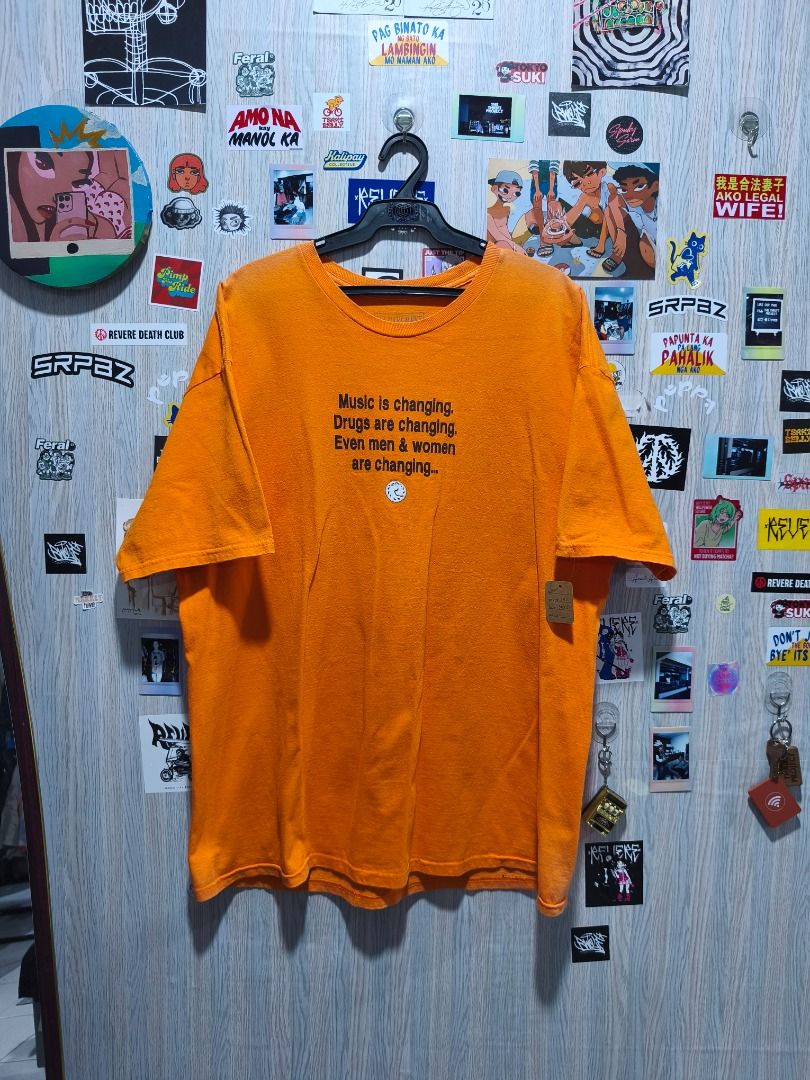 ​Pleasures "Time" Tee (Category: Tshirts & Polo Shirts ) located in Davao. Submitted by thethriftproject082 (Listing ID 1467794749, Image 2). Description: ​Pleasures "Time" Tee 📍𝐌𝐈𝐍𝐄: 450 📍𝐒𝐈𝐙𝐄 𝐎𝐍 𝐓𝐀𝐆: 2XL 📍𝐃𝐈𝐌𝐄𝐒: 24 x 30 - Brand: Pleasures - Color: Bright Orange - Condition: Clean overall - Material: Cotton - Design: Front chest text ("Music is changing...") and large distorted clock graphic on the back - Fit/Style: Short sl