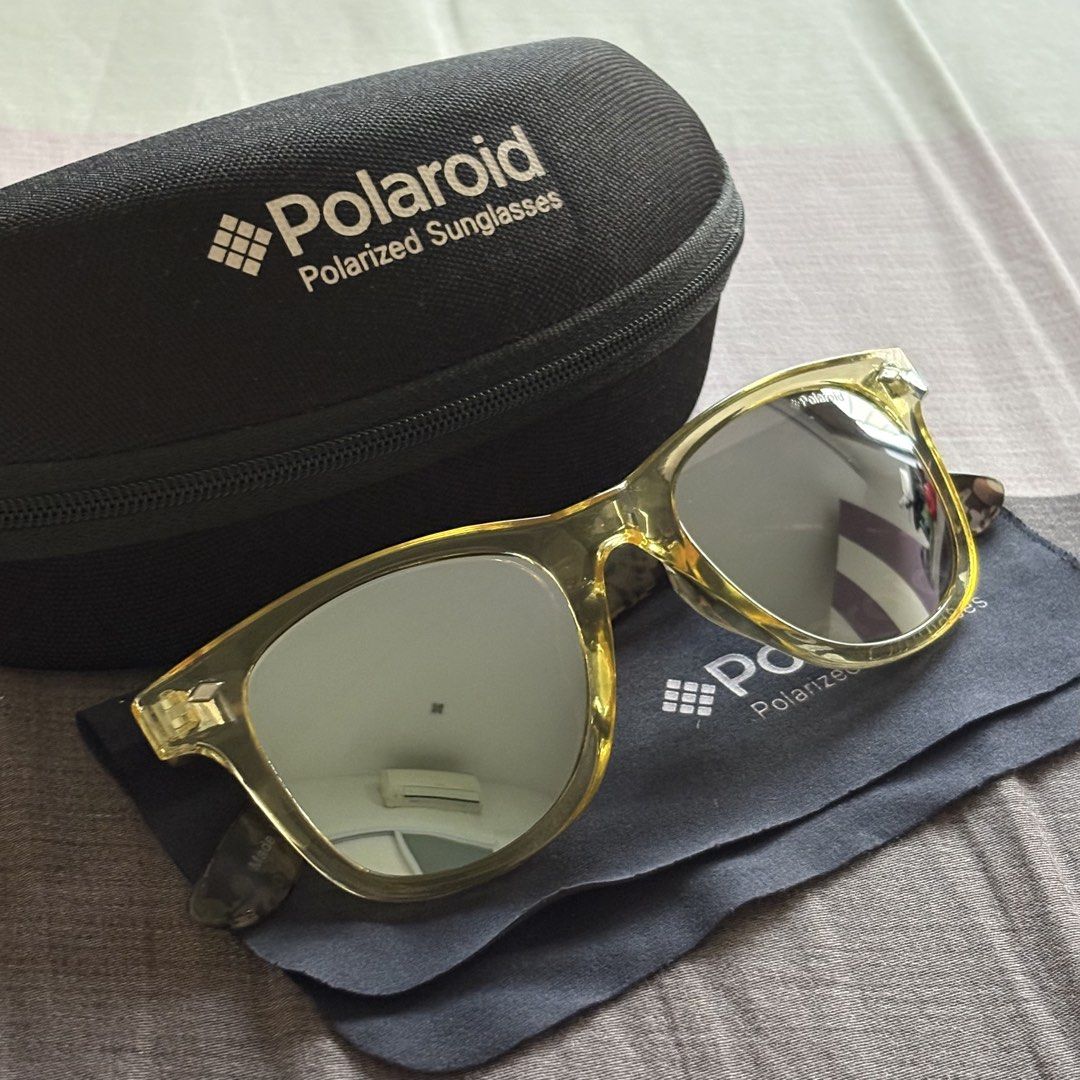 Polaroid Polarized Sunglasses (Category: Sunglasses & Eyewear) located in Quezon City. Submitted by snoopiii (Listing ID 1467681519, Image 3). Description: RFS: Decluttering Loc: QC.
