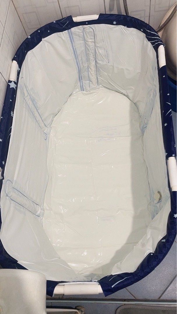 Portable Adult Bathtub (Category: Bathtub & Bath Accessories) located in Marikina City. Submitted by luiliam (Listing ID 1467650403, Image 3). Description: Portable Bathtub Used only once, not totally filled with water only 4” water height inside the tub Don’t need anymore coz floor sink already fixed Php 700 (fixed price), bought it almost Php 900 Good as new - Dimensions: 120cm (L) x 50cm (W) x 55cm (H) - Complete set includes connecting rods a