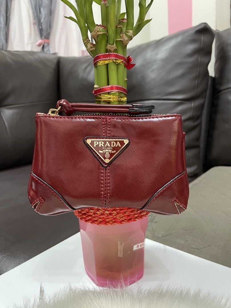 Prada Coin Purse (Category: Purses & Pouches) located in Mandaue City. Submitted by ludz_0246 (Listing ID 1467690611, Image 1). Description: Gold Hardware Logo and Etekita In blue Genuine Leather Gamouza Inside With 3 Card Slot No flaw Actual Photo With Dustbag .
