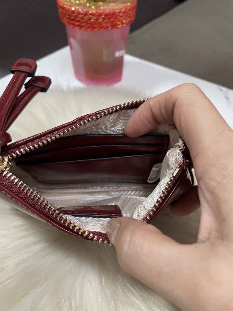 Prada Coin Purse (Category: Purses & Pouches) located in Mandaue City. Submitted by ludz_0246 (Listing ID 1467690611, Image 3). Description: Gold Hardware Logo and Etekita In blue Genuine Leather Gamouza Inside With 3 Card Slot No flaw Actual Photo With Dustbag .