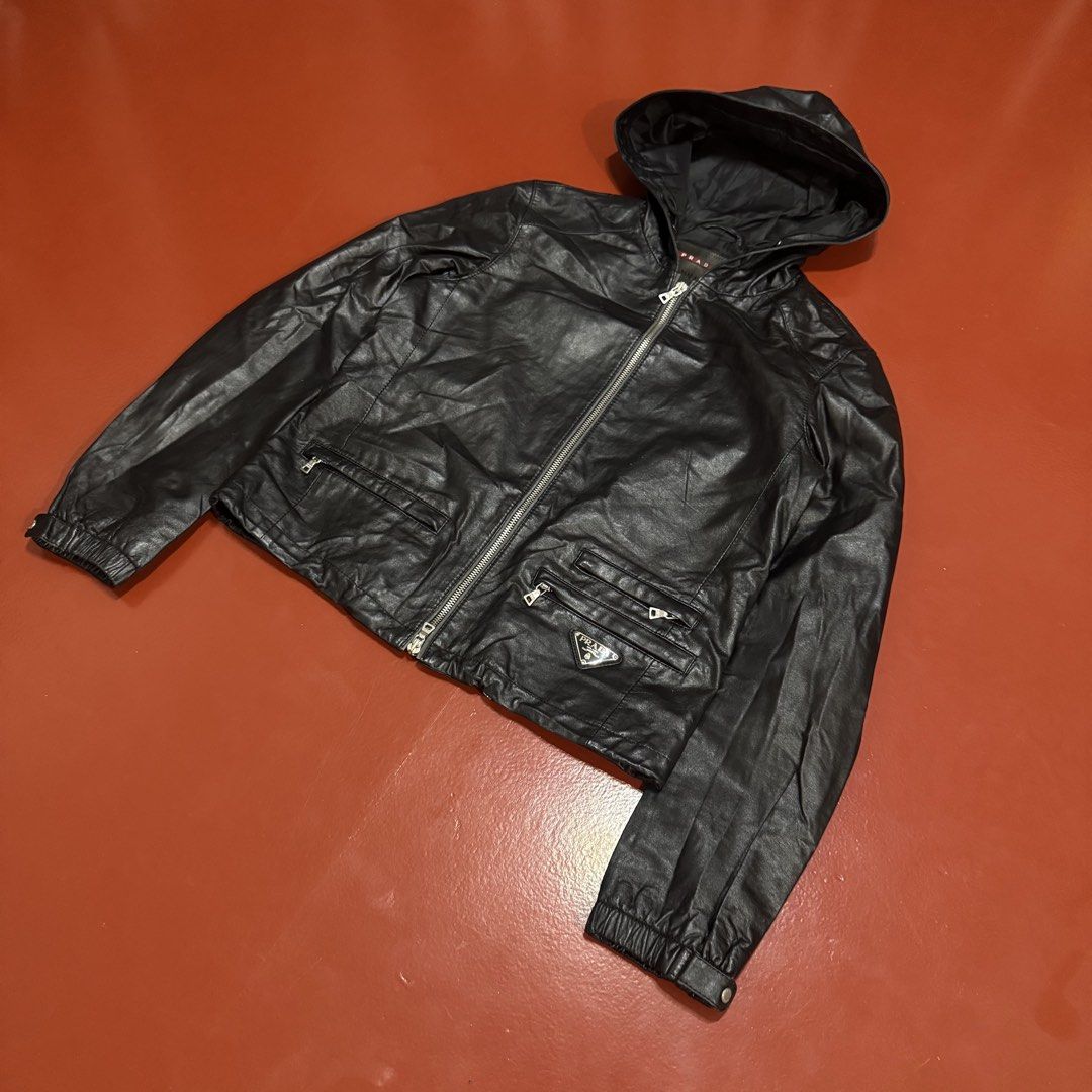 PRADA LEATHER JACKET (Category: Coats, Jackets and Outerwear) located in Pasig City. Submitted by buzzthrifty (Listing ID 1467721796, Image 3). Description: SIZE S-M 18x22 EXCELLENT CONDITION .