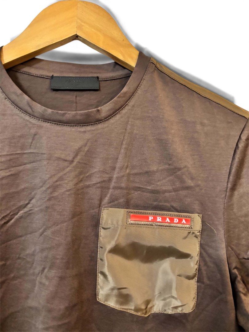 Prada long-sleeve crewneck top (Category: Coats, Jackets and Outerwear) located in Calamba. Submitted by manila.fits (Listing ID 1467721858, Image 2). Description: Prada long-sleeve crewneck top Small Width 18.5 Length 25.5 As new No issue.